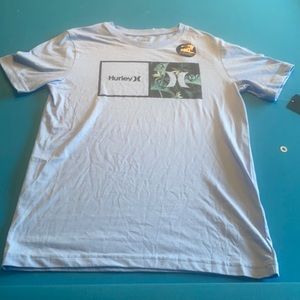 Light blue Hurley T-shirt size large. Brand new with tags
